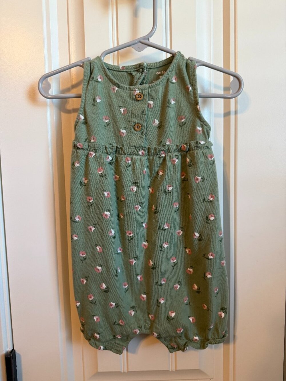 Sage green romper with keyhole back and button